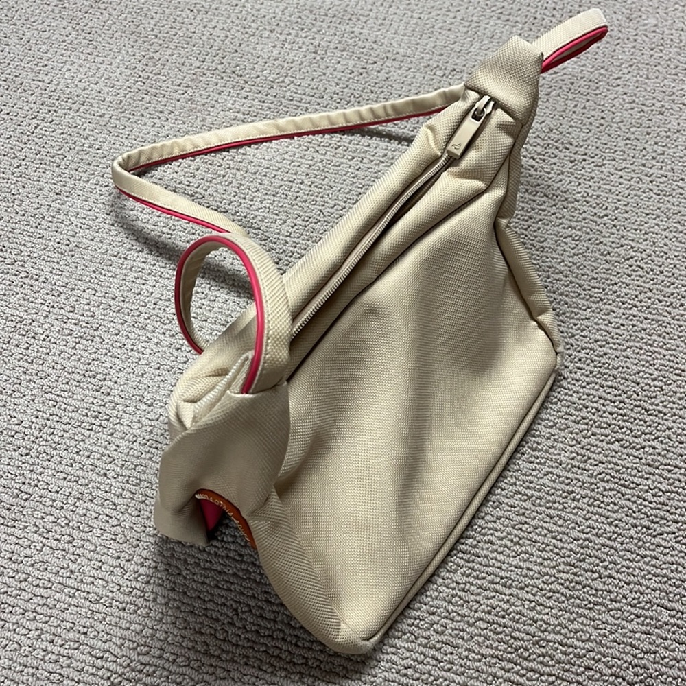 Mandarina Duck Adjustable Shoulder Bag. Beige with hot pink piping.